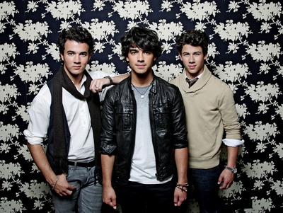 the Jonas Brothers wooden framed poster